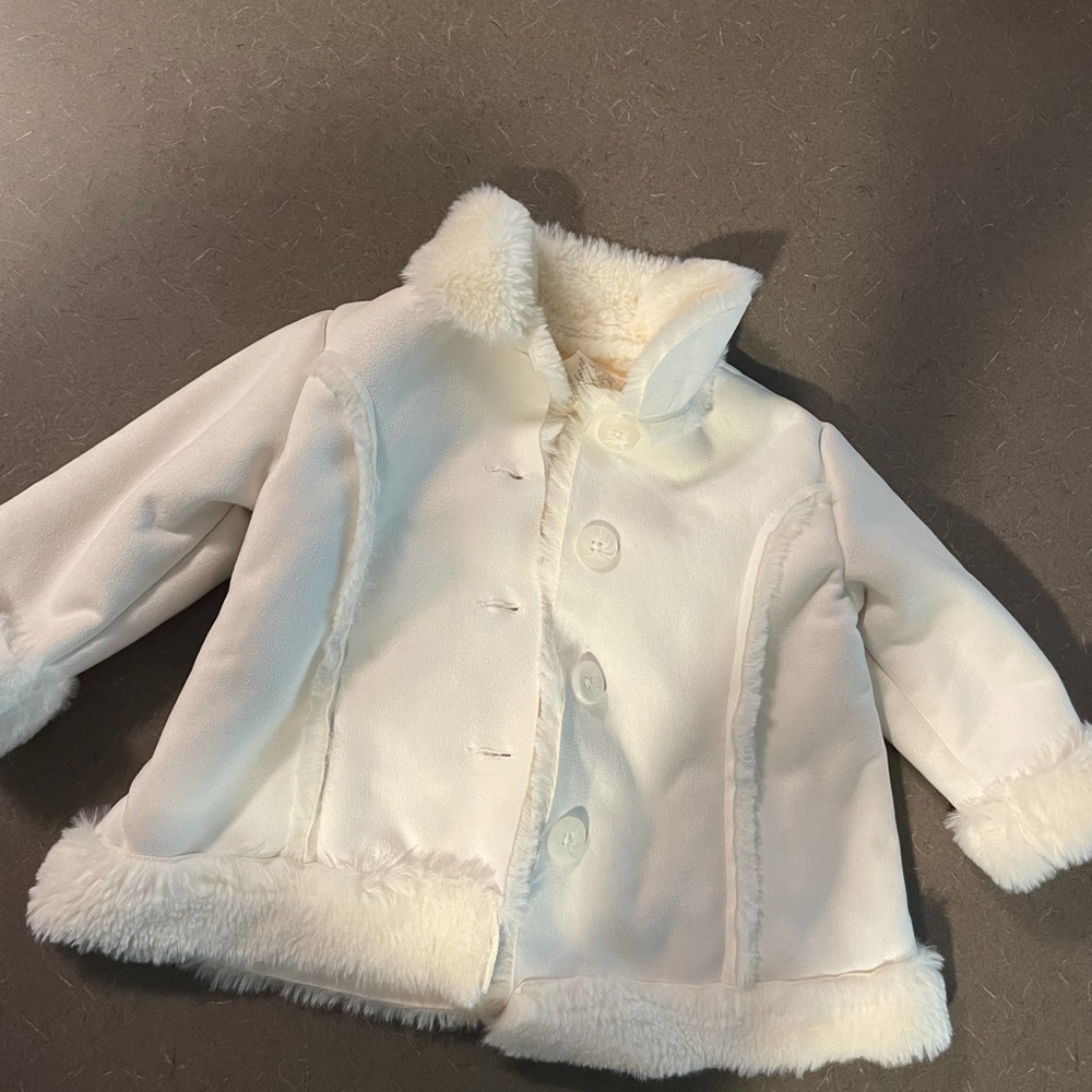Baby girls coat. Used. Size 6-9 months.